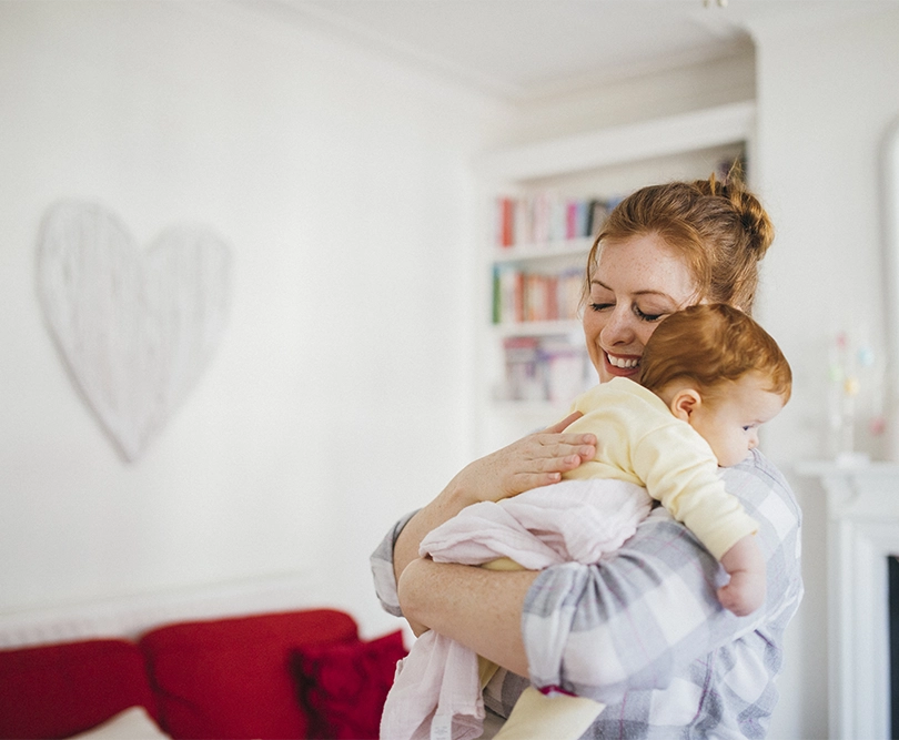 mum and baby cuddling